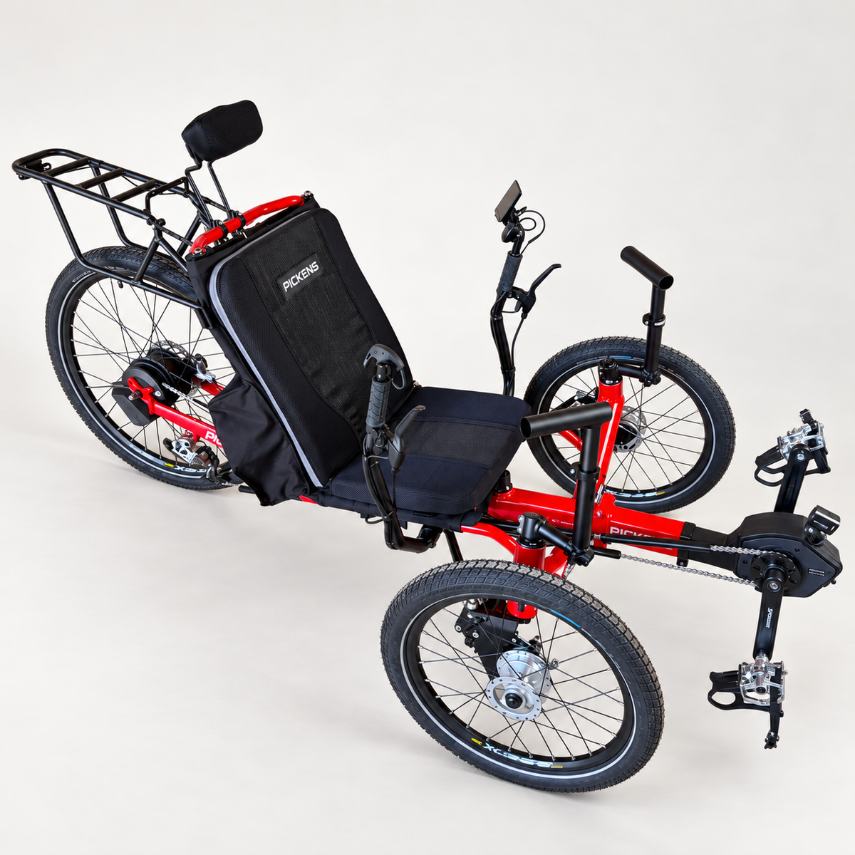 Racing Red Pickens SC28E electric-assist recumbent trike in a studio.